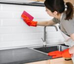 woman-cleaning-with-rag_23-2148520996